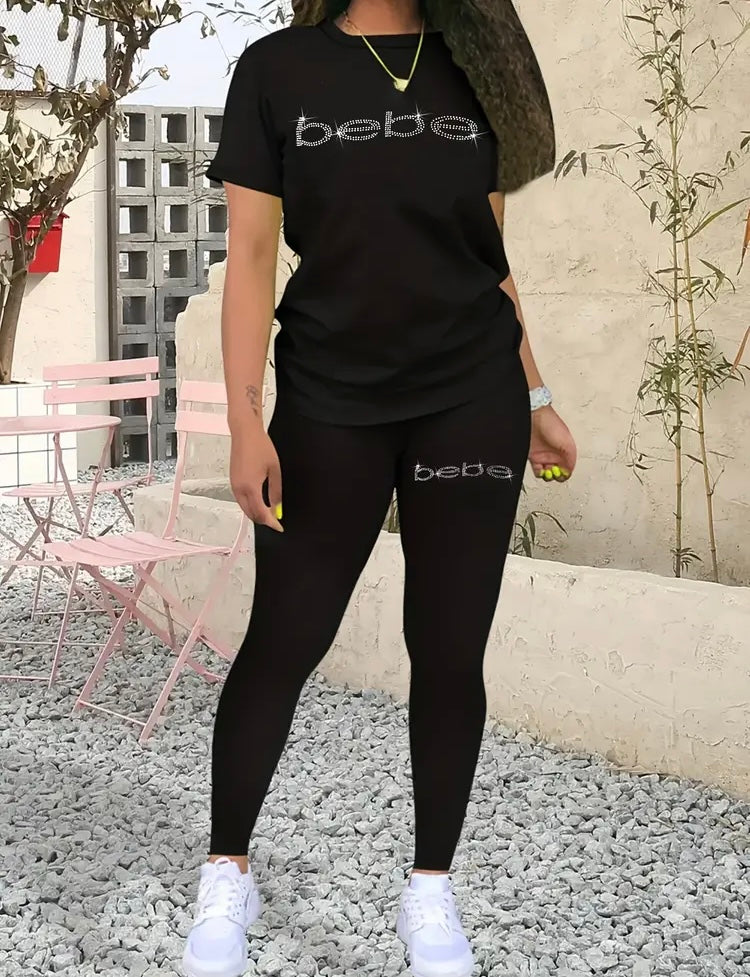 Bebe Plus Size Two-Piece Outfit Set w Sparkling Rhinestone Letters Top and Comfortable Pants Women's Fashionable Clothing for Everyday Wear
